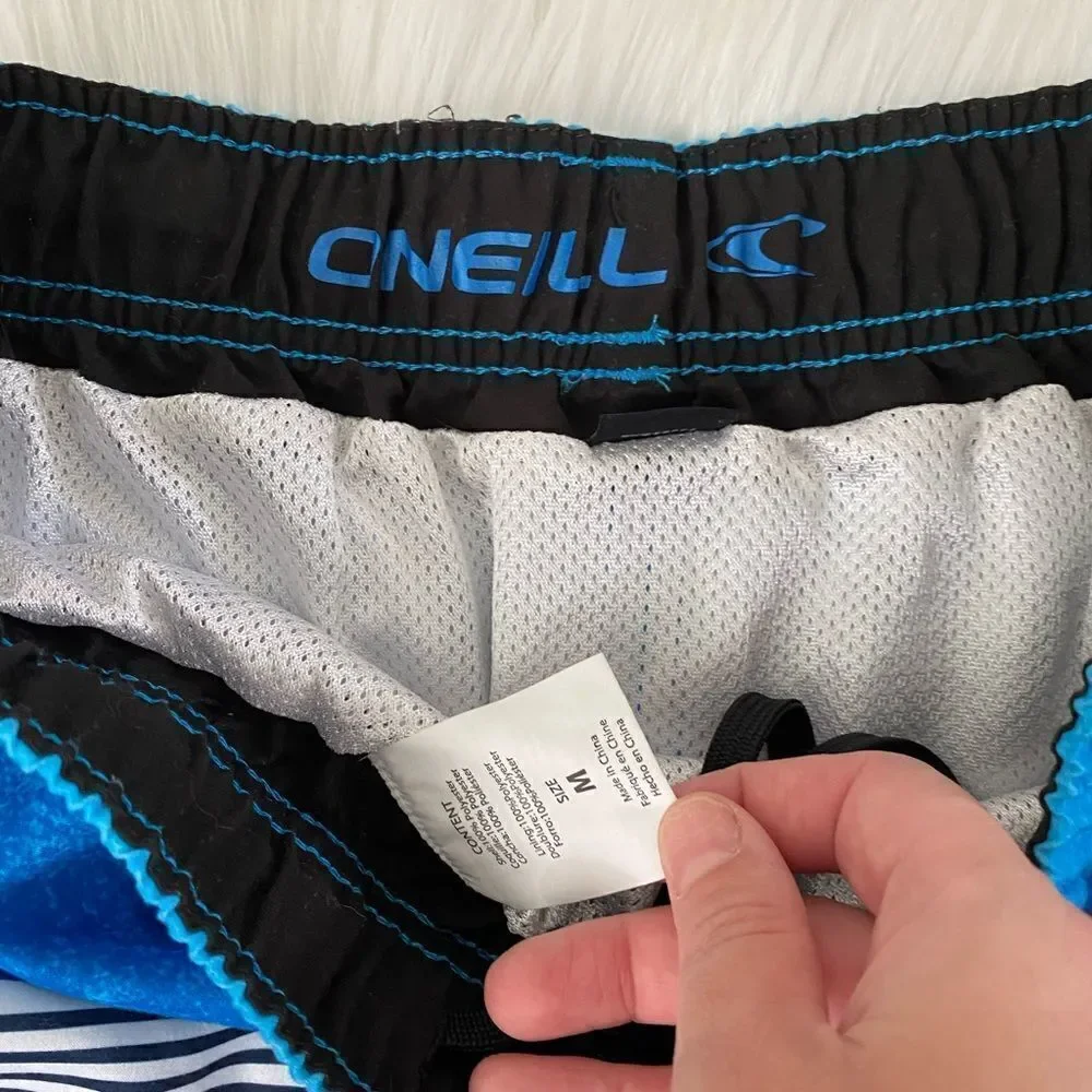 MENS ONEILL BOARD SHORTS SIZE MEDIUM